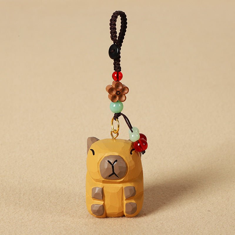 【2個でお得！組み合わせ自由】【カピバラの置物｜カピバラのバッグチャーム】 ナチュラル 可愛い 手作り 木彫り カピバラグッズ 置物 バッグチャーム 癒し 厄除け オブジェ ストラップ 小さい 玄関 風水 引越し祝い 贈り物 プレゼント 幸運 お守りストラップ ミニチュア 木製雑貨 - RabbPig