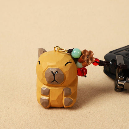 【2個でお得！組み合わせ自由】【カピバラの置物｜カピバラのバッグチャーム】 ナチュラル 可愛い 手作り 木彫り カピバラグッズ 置物 バッグチャーム 癒し 厄除け オブジェ ストラップ 小さい 玄関 風水 引越し祝い 贈り物 プレゼント 幸運 お守りストラップ ミニチュア 木製雑貨 - RabbPig
