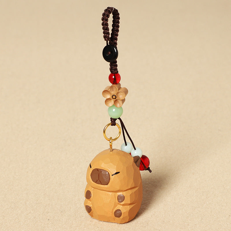 手作りの可愛いカピバラの木製チャームと木製置物。天然木材と天然石を使用した、お守りとしても最適な贈り物。