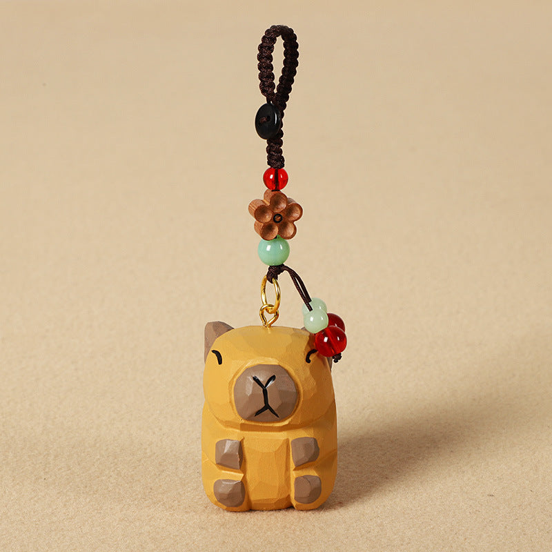 手作りのカピバラの木製チャームと木製置物。天然木材と天然石を使用した、お守りとしても最適な贈り物。