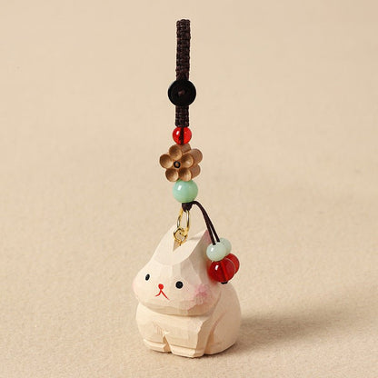 【兎の置物｜兎のバッグチャーム】 ナチュラル 可愛い 手作り 木彫り 置物 兎グッズ バッグチャーム 癒し 厄除け オブジェ ストラップ 小さい 玄関 風水 引越し祝い 贈り物 プレゼント 幸運 お守りストラップ ミニチュア 木製雑貨 - RabbPig