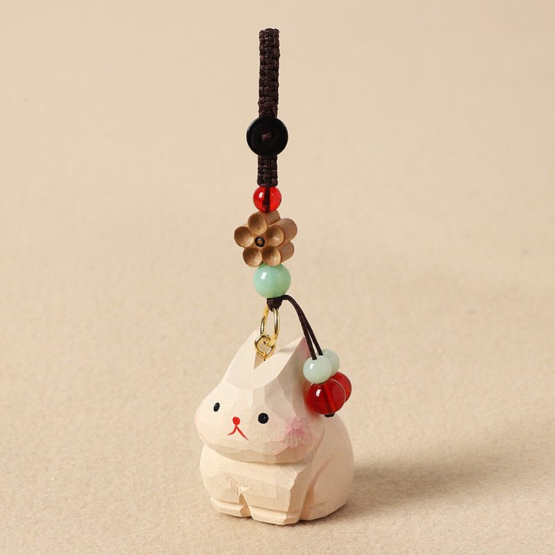 【兎の置物｜兎のバッグチャーム】 ナチュラル 可愛い 手作り 木彫り 置物 兎グッズ バッグチャーム 癒し 厄除け オブジェ ストラップ 小さい 玄関 風水 引越し祝い 贈り物 プレゼント 幸運 お守りストラップ ミニチュア 木製雑貨 - RabbPig